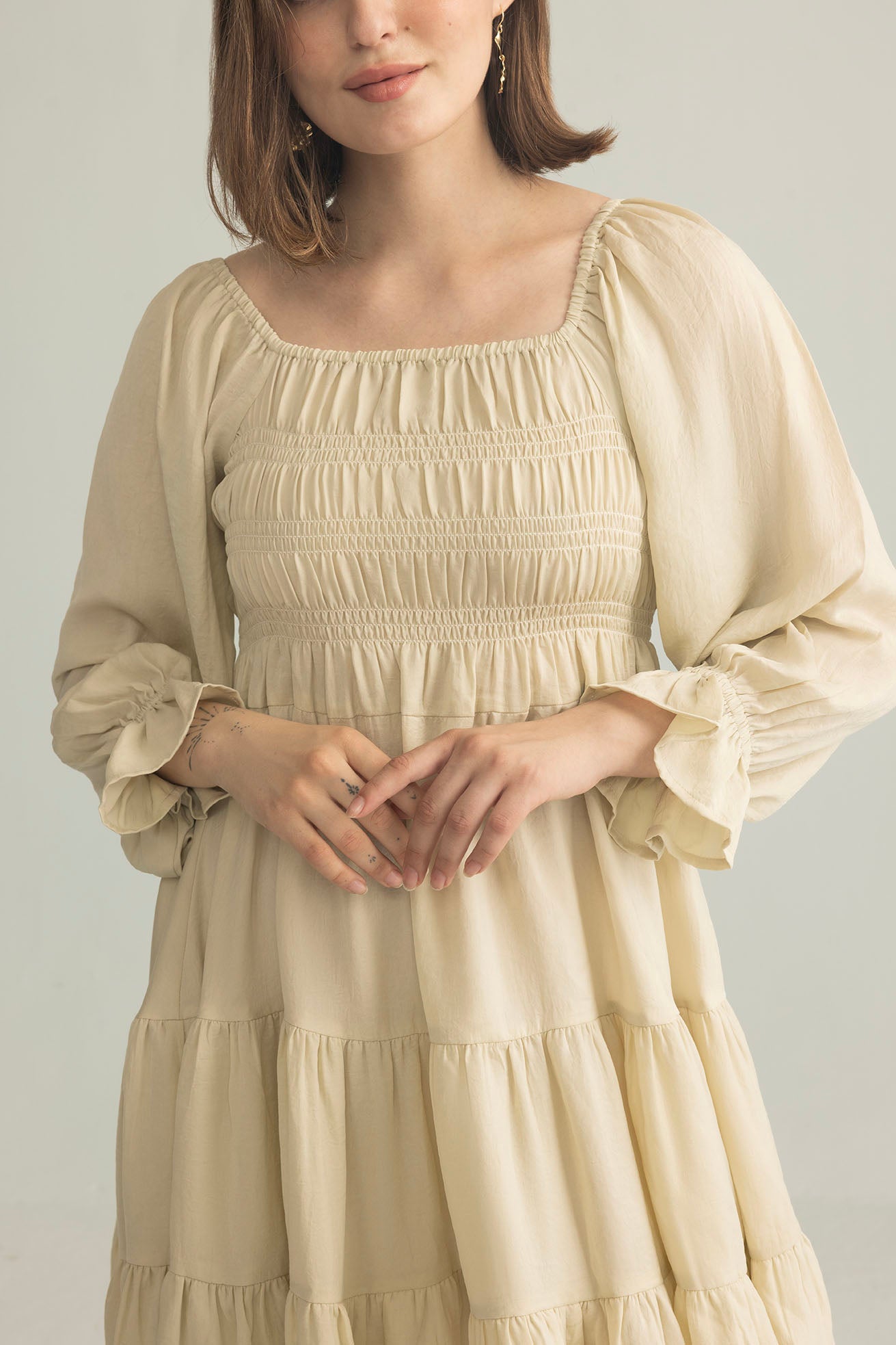 Daisywood Ruffle Smocking Dress in Oatmeal - Myra USA