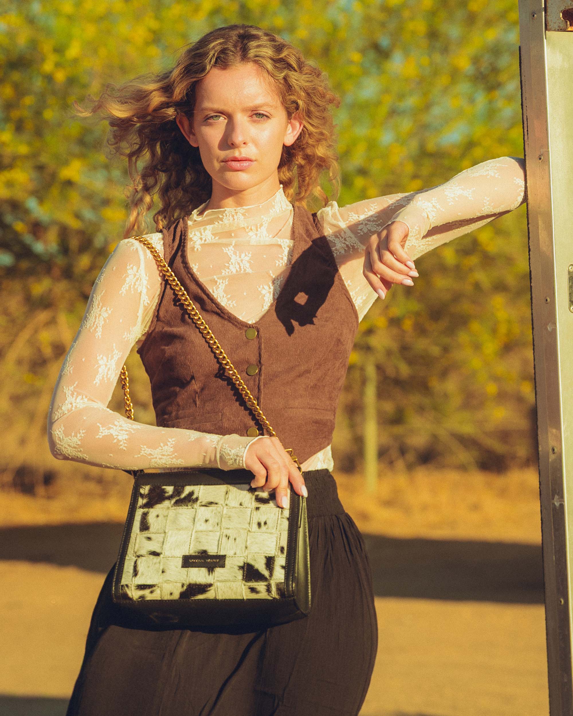 Loyal West SCRAPPY MEDIUM CHAIN BAG IN COWHIDE AND BLACK CALFSKIN - Myra USA