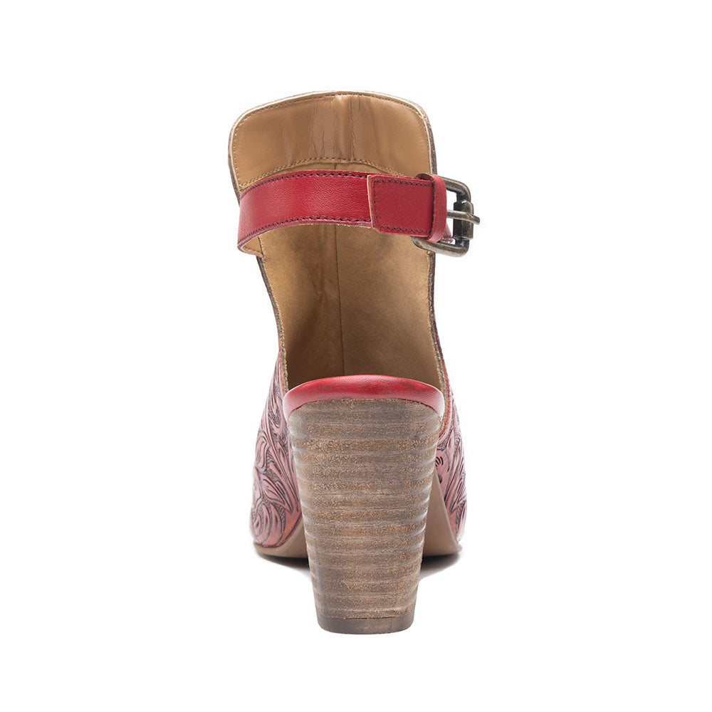 Red handtooled leather heels with a Western flair