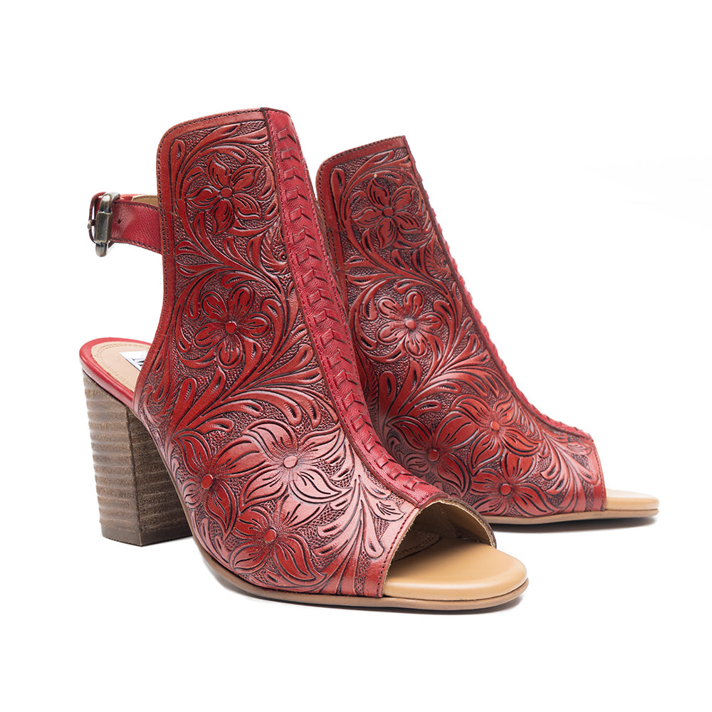 Red handtooled leather heels with a Western flair