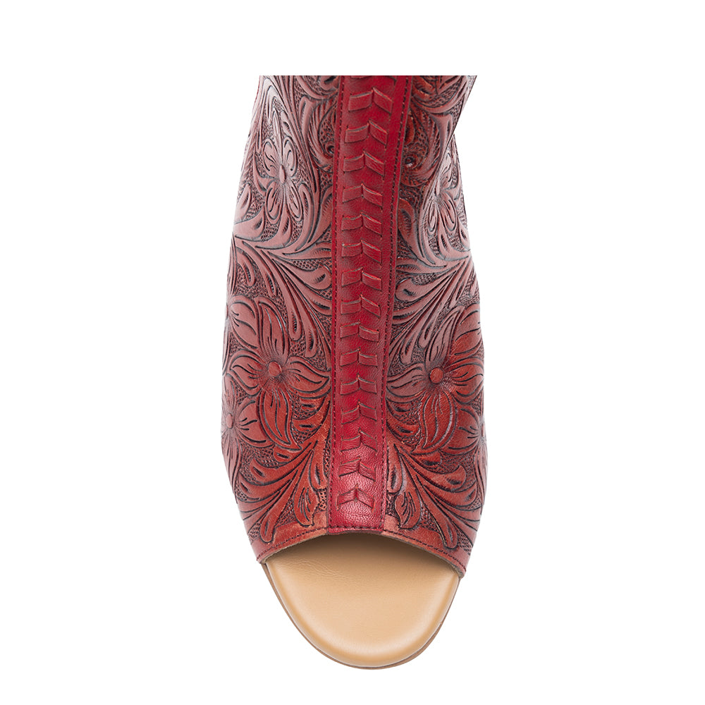 Red handtooled leather heels with a Western flair