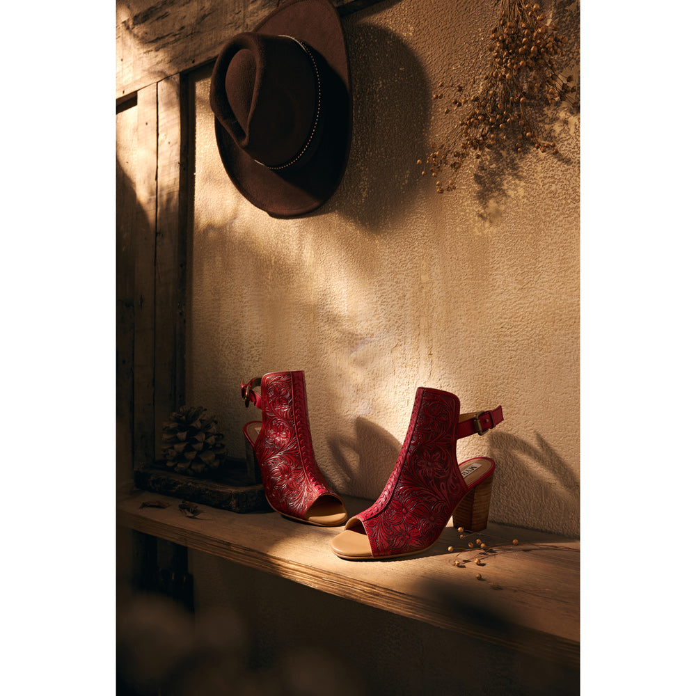 Red handtooled leather heels with a Western flair