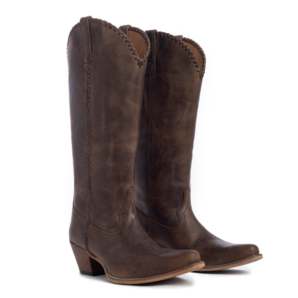 Brown cowboy boot with visible stitching details
