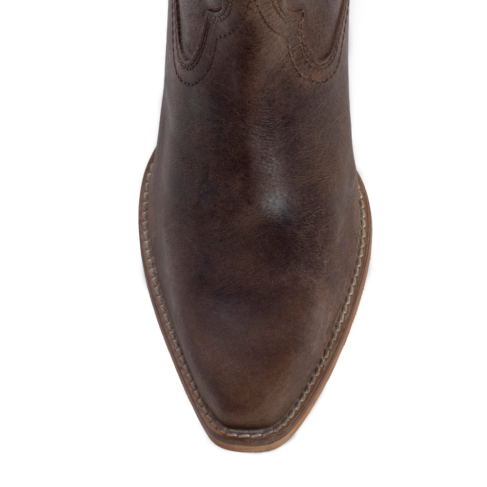 Brown cowboy boot with visible stitching details
