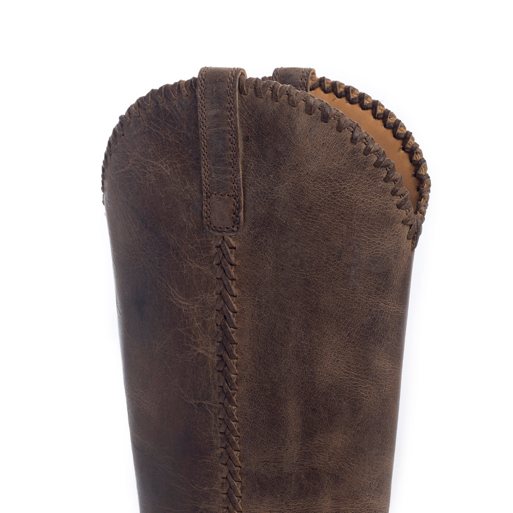 Brown cowboy boot with visible stitching details