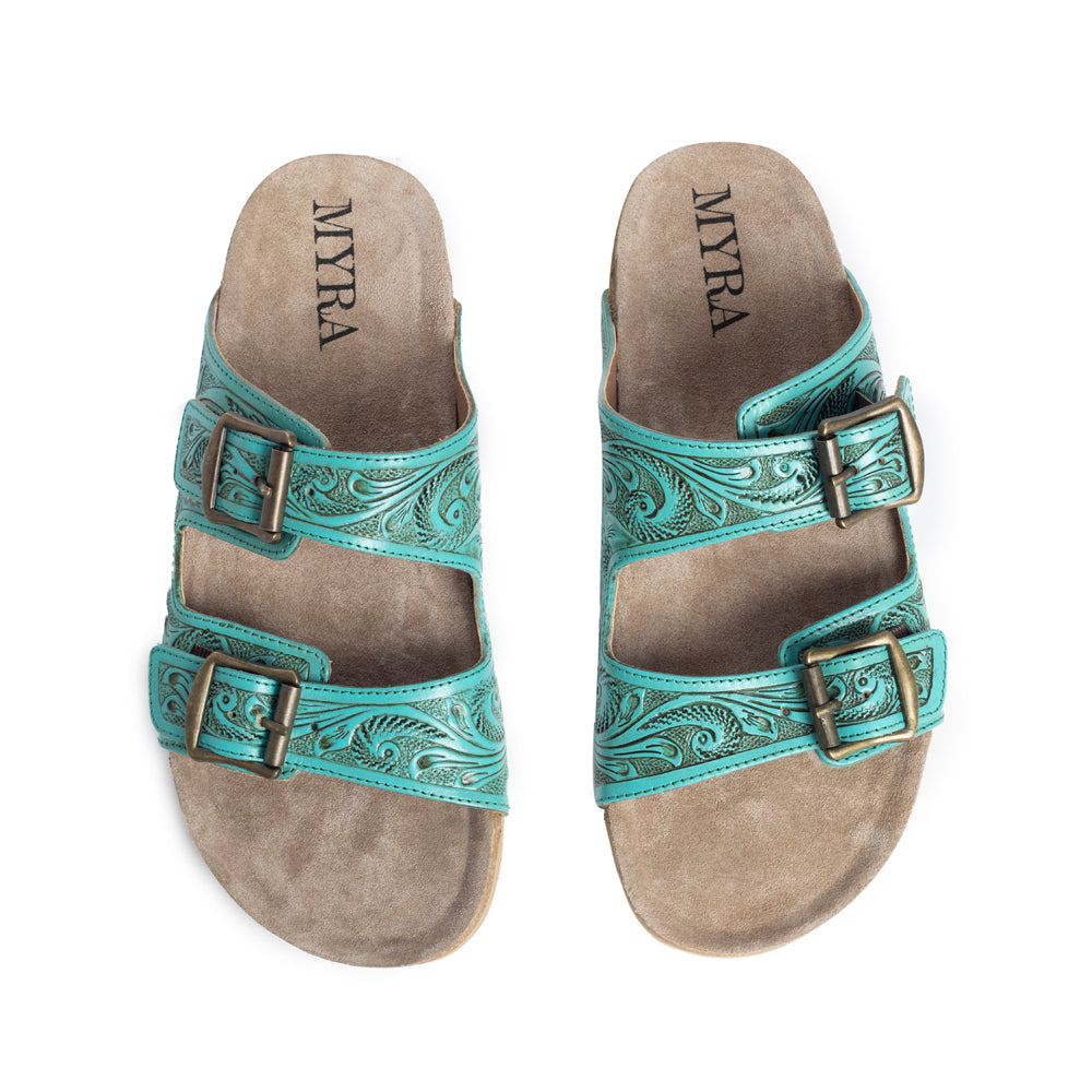Hand-tooled leather sandals with intricate turquoise color and floral designs