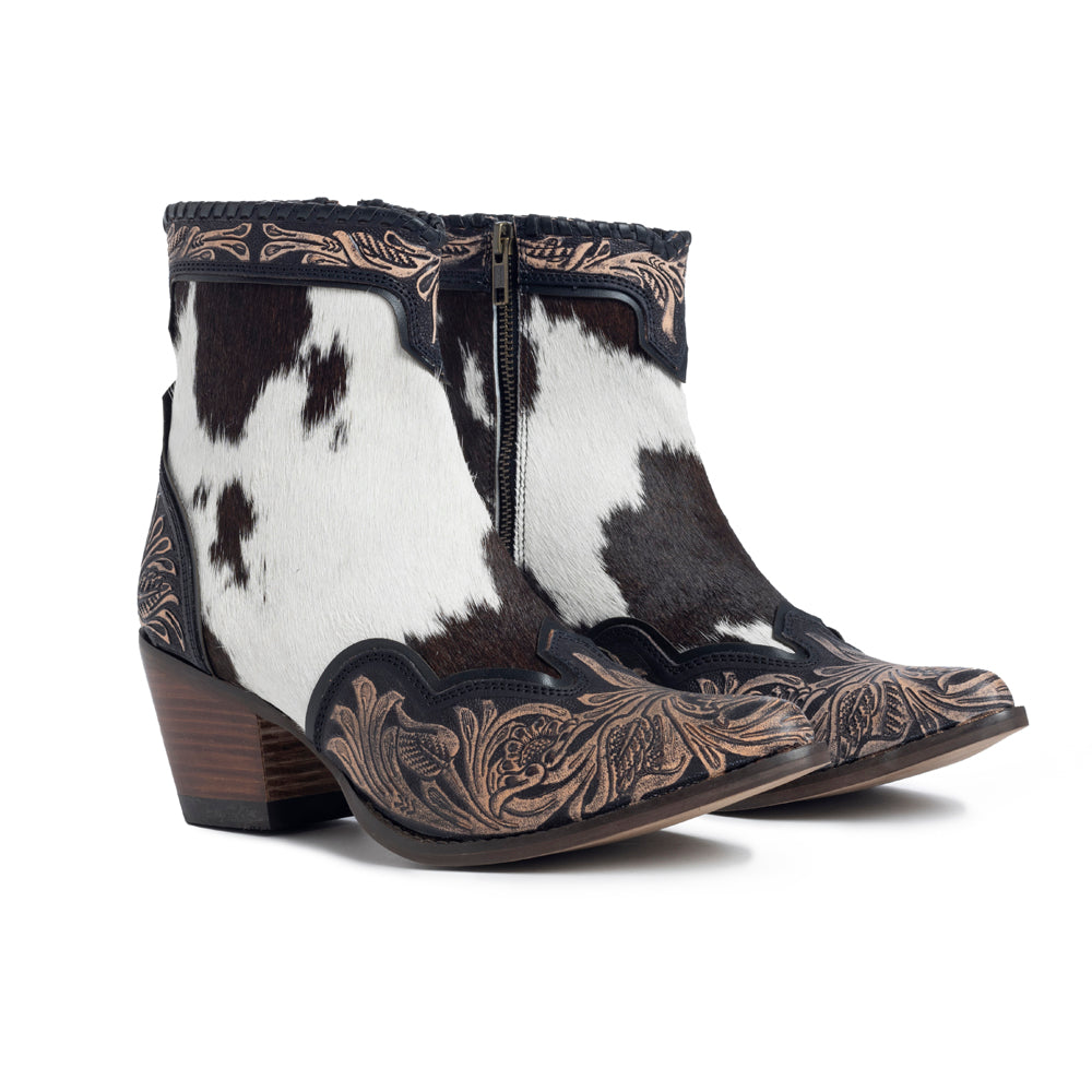 Women's Western Booties in white, black, and brown colors of cowhide patterns