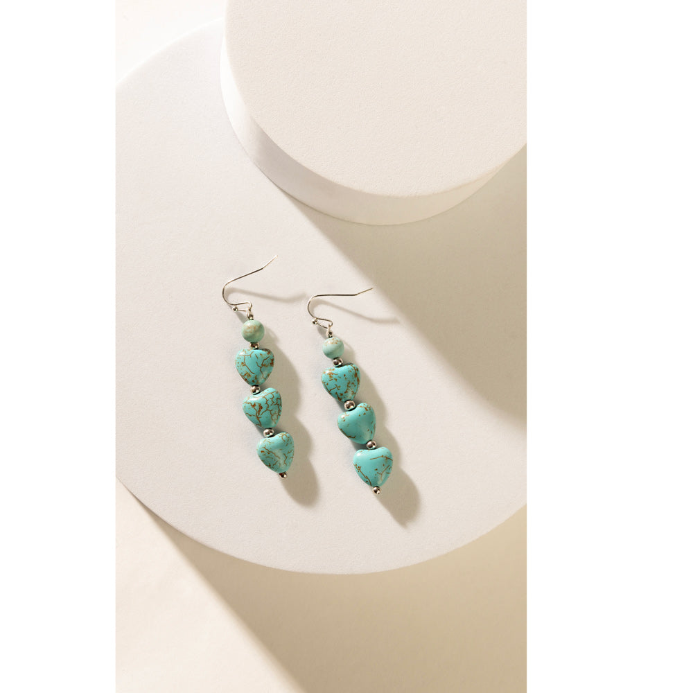 Flowing Hearts Earrings In Blue - Myra USA