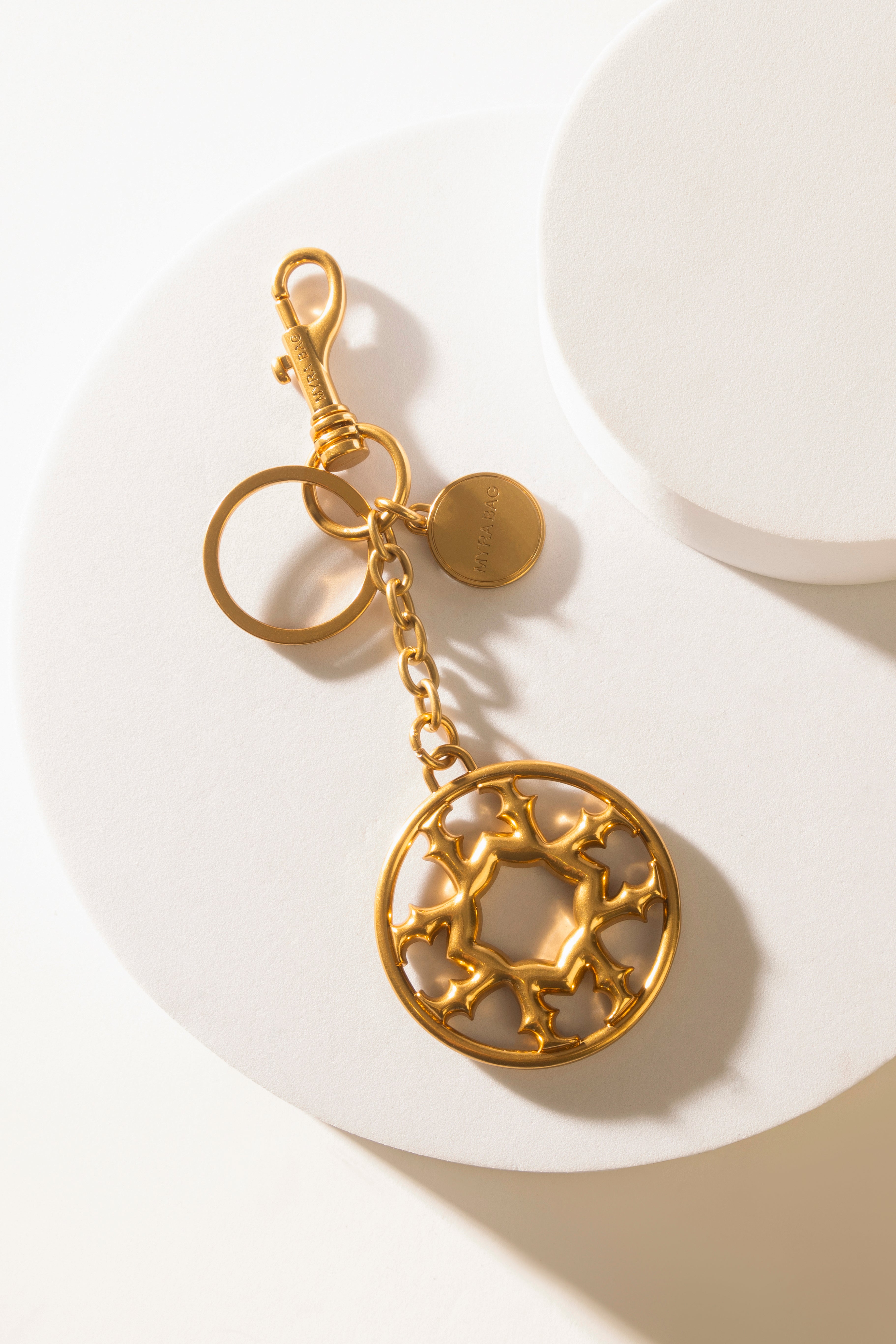 Myra Legacy Loop Charm in Antique Gold - Myra USA