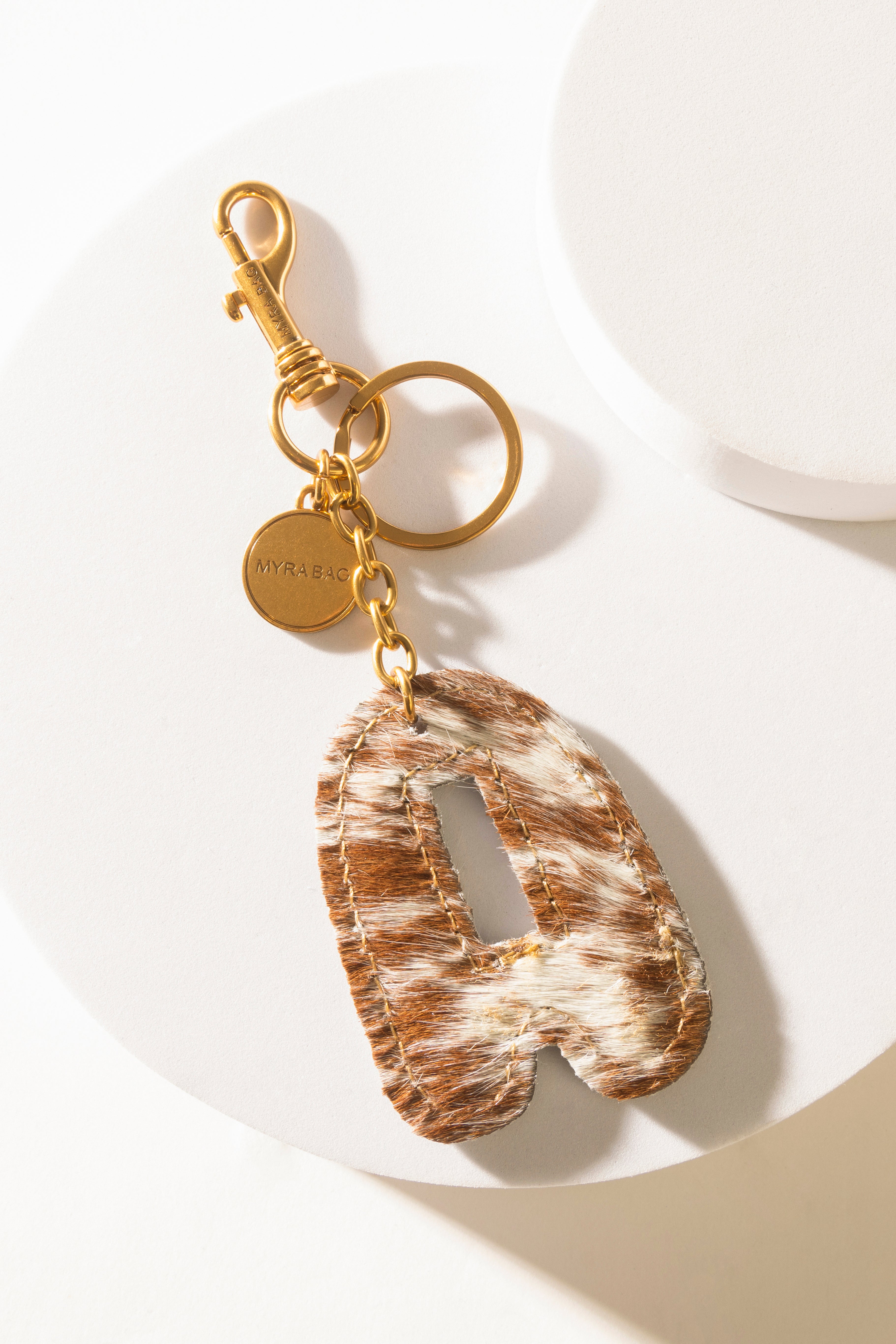 Alpha Hairon Bag Charm in Brown & White - Myra USA