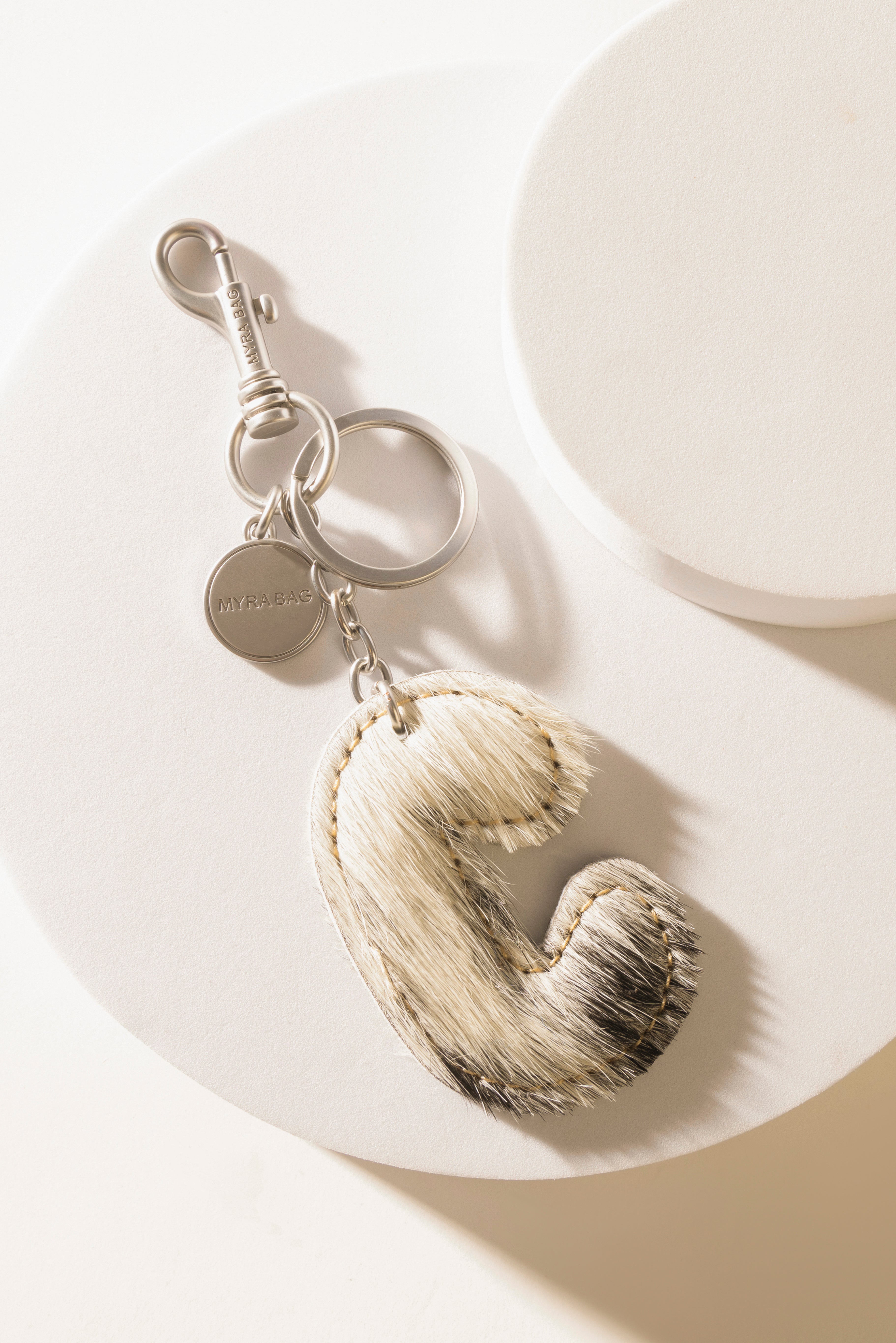 Alpha Hairon Bag Charm in Black & White - Myra USA