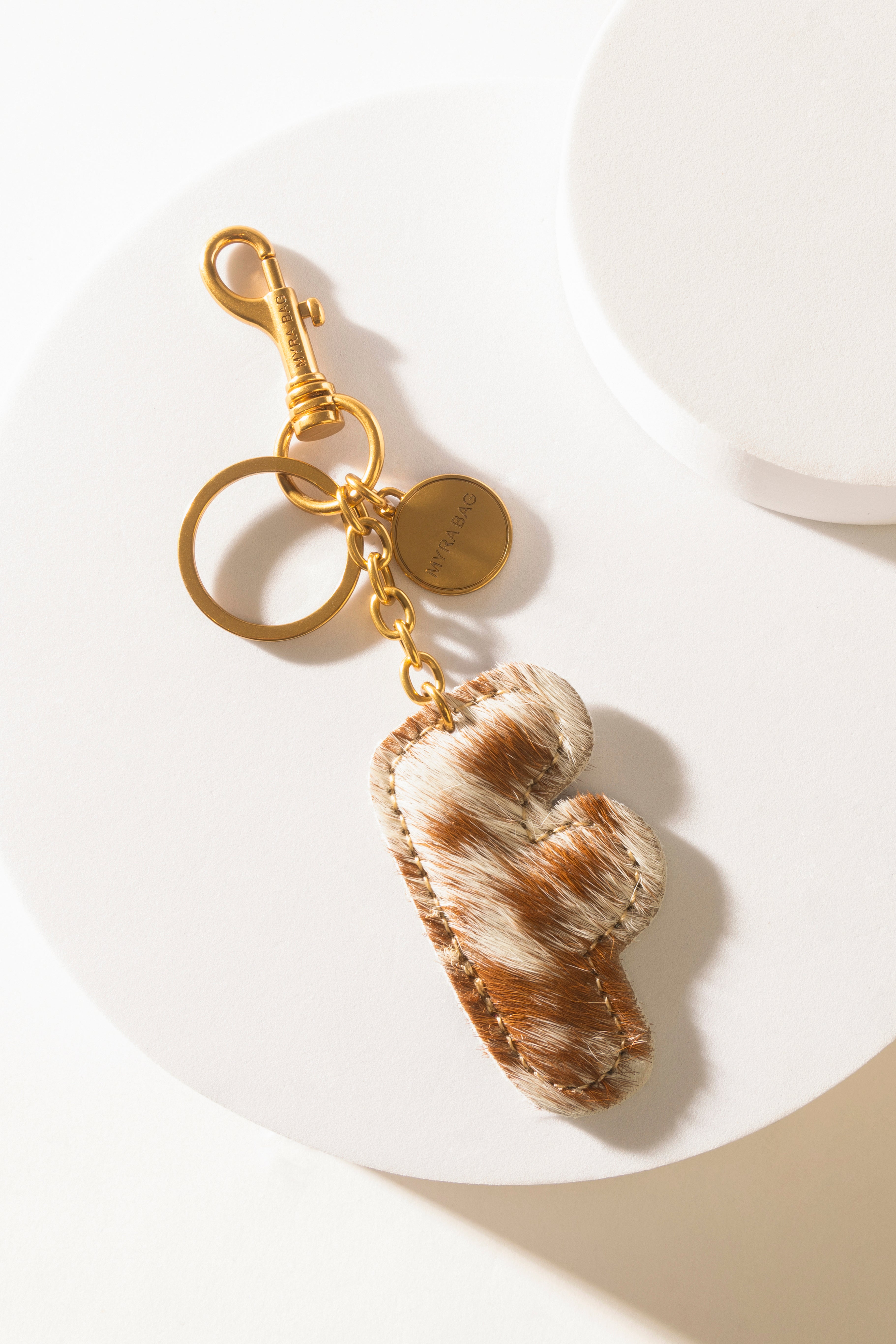 Alpha Hairon Bag Charm in Brown & White - Myra USA
