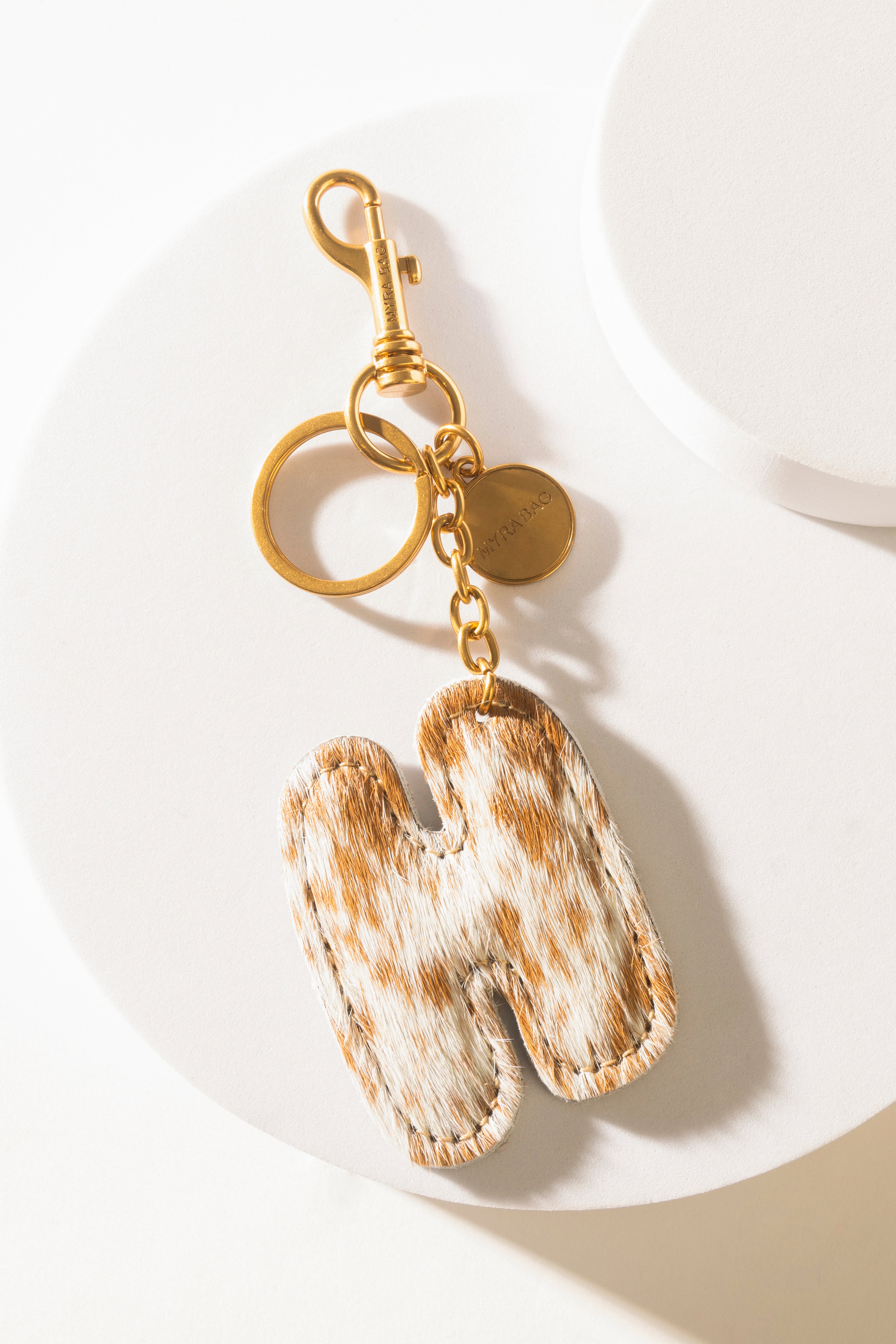 Alpha Hairon Bag Charm in Brown & White - Myra USA