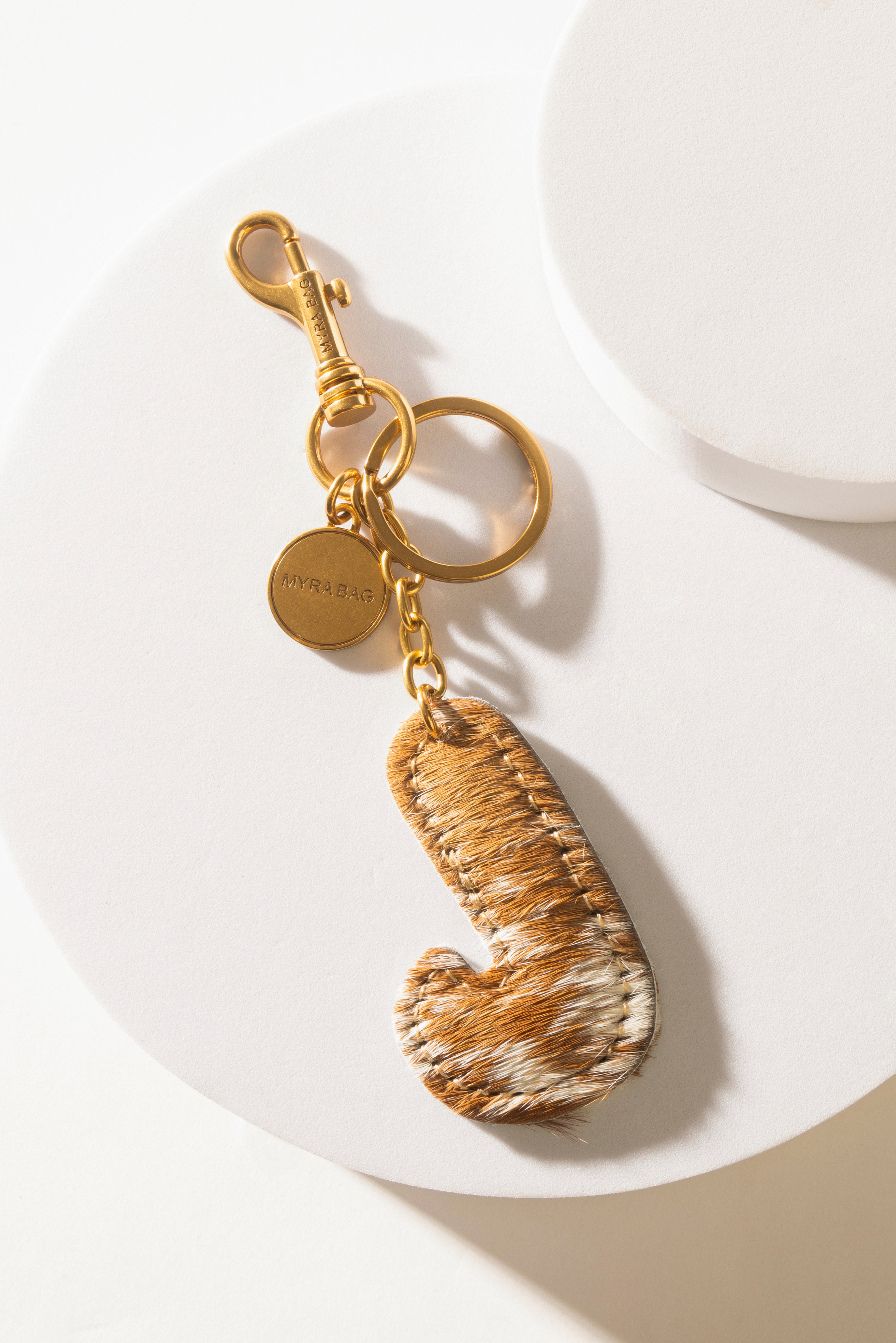 Alpha Hairon Bag Charm in Brown & White - Myra USA