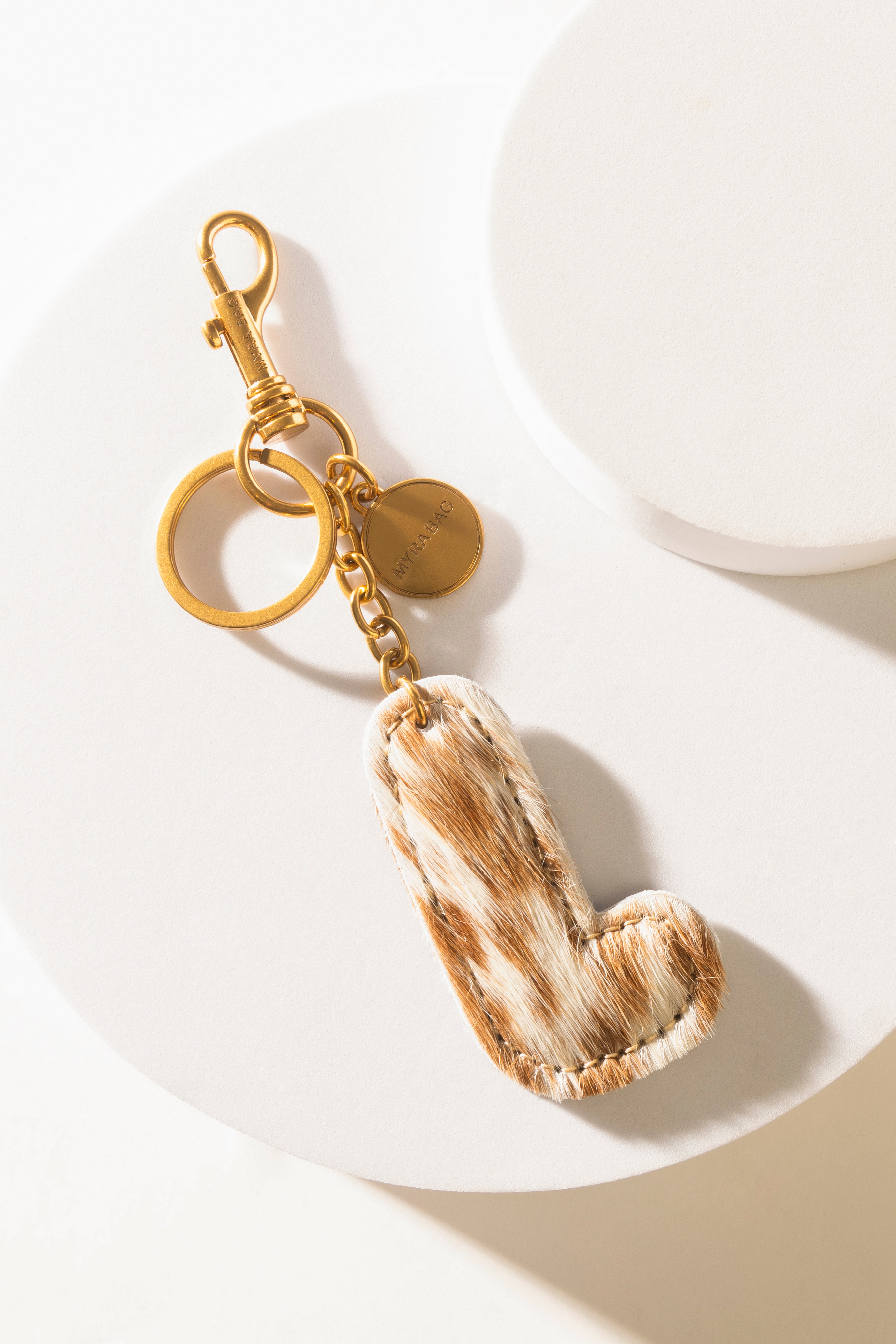 Alpha Hairon Bag Charm in Brown & White - Myra USA