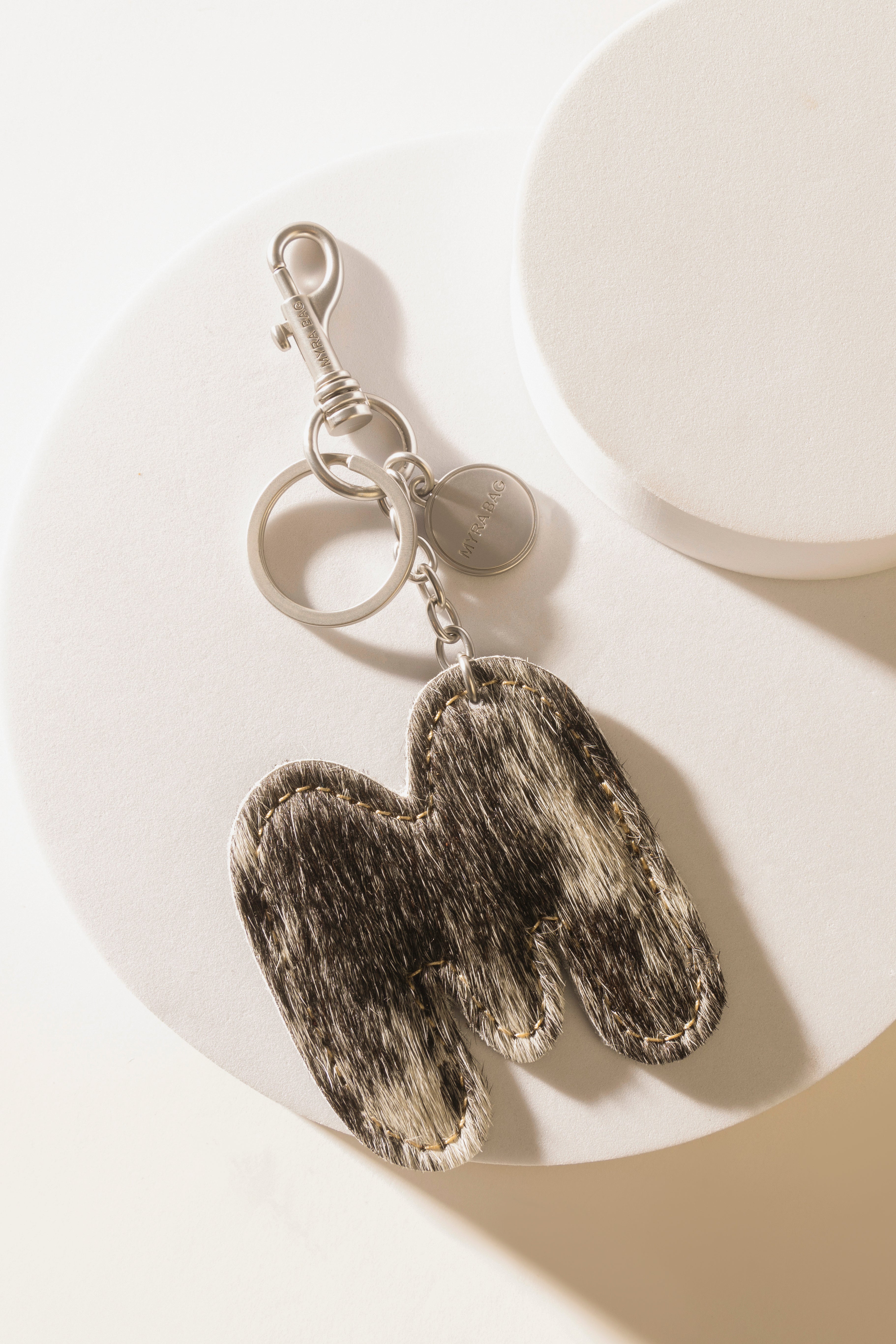 Alpha Hairon Bag Charm in Black & White - Myra USA