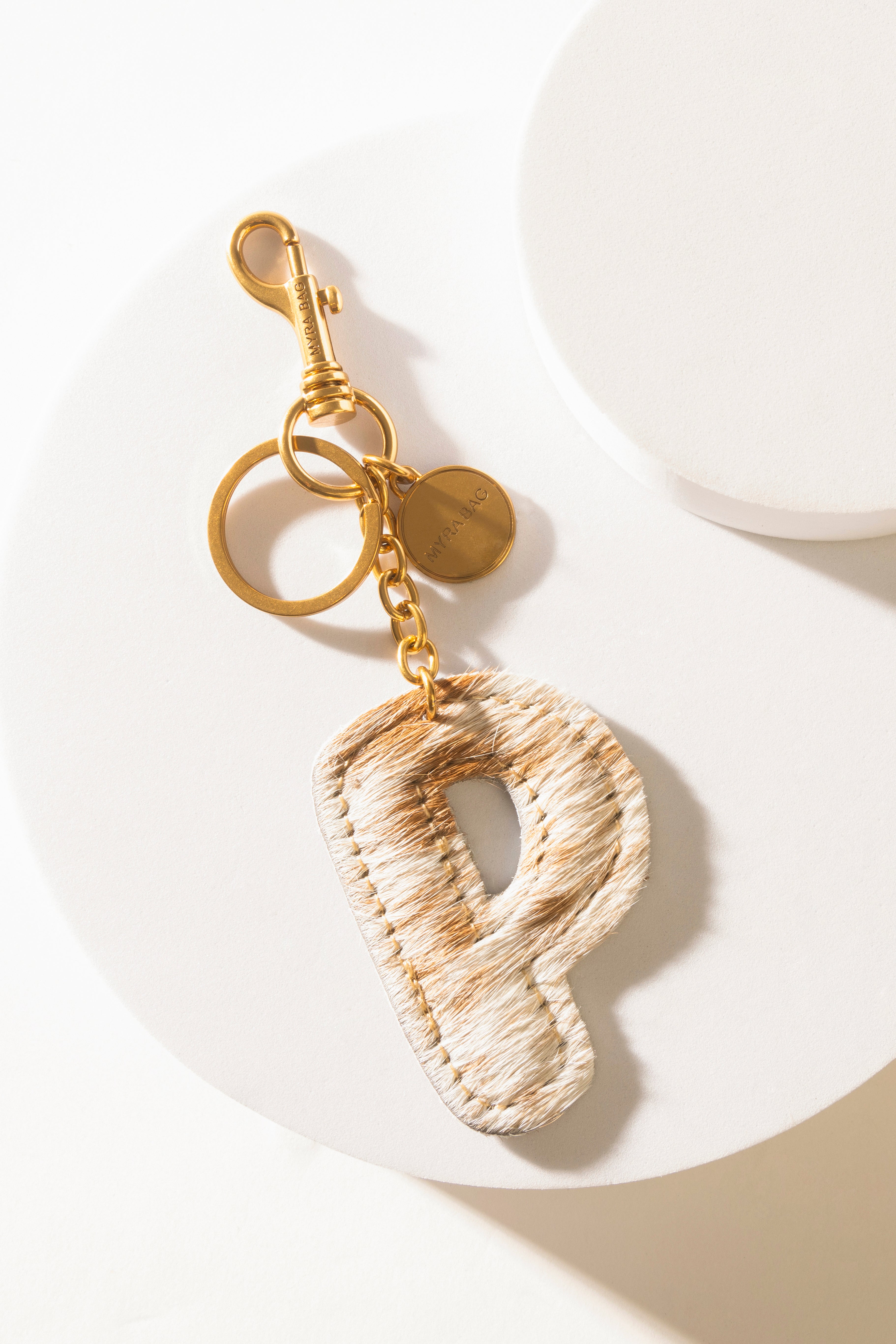 Alpha Hairon Bag Charm in Brown & White - Myra USA