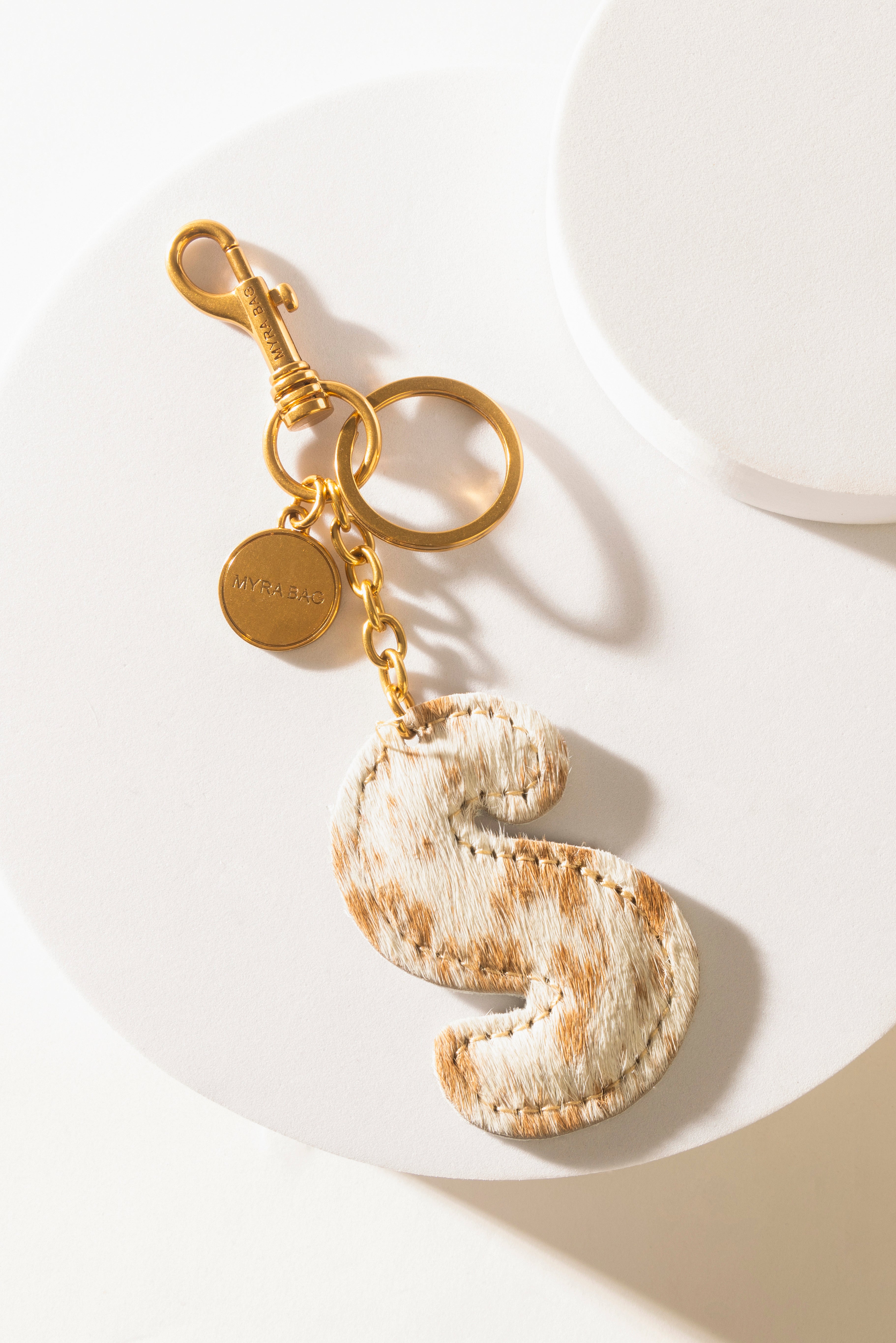 Alpha Hairon Bag Charm in Brown & White - Myra USA