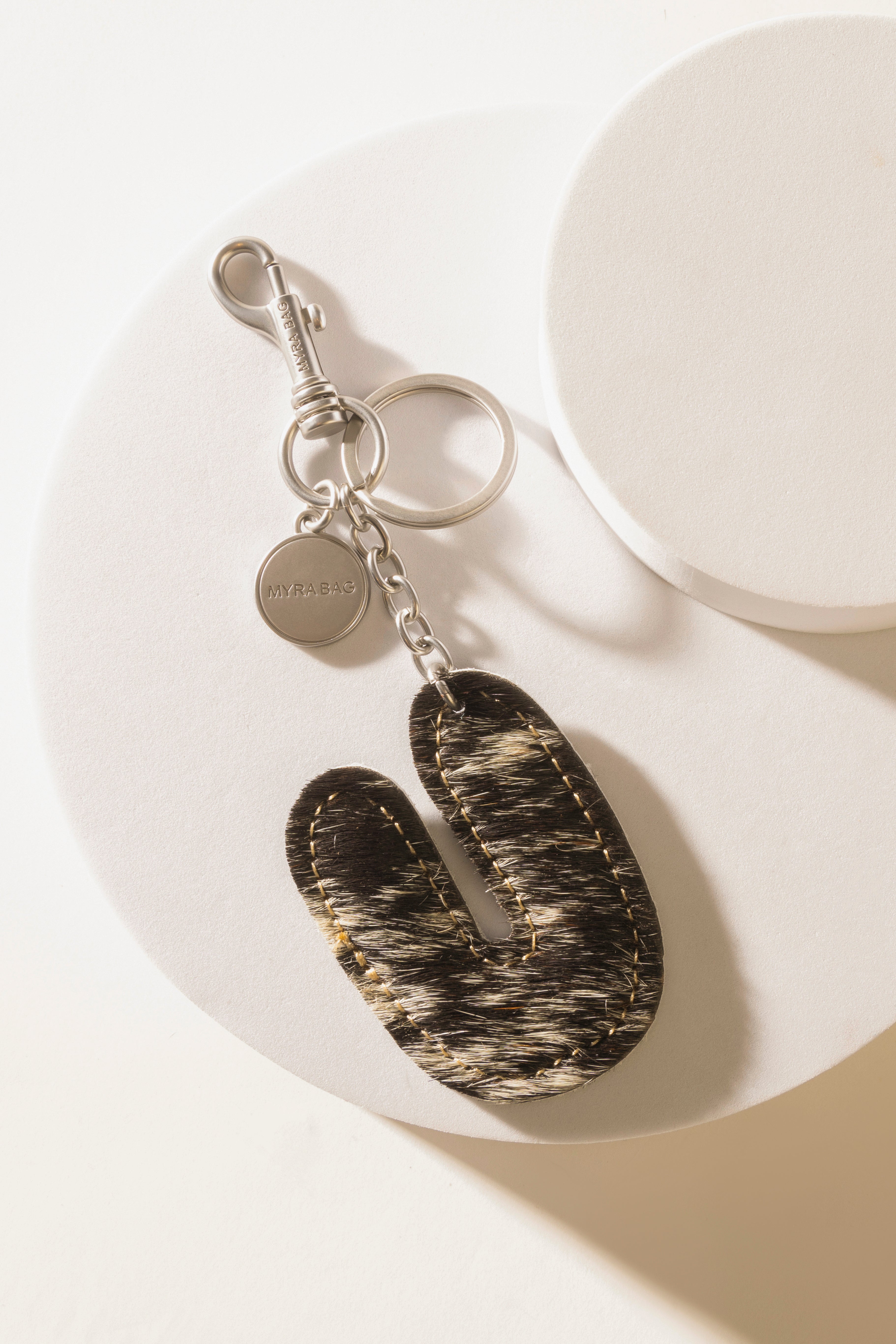 Alpha Hairon Bag Charm in Black & White - Myra USA