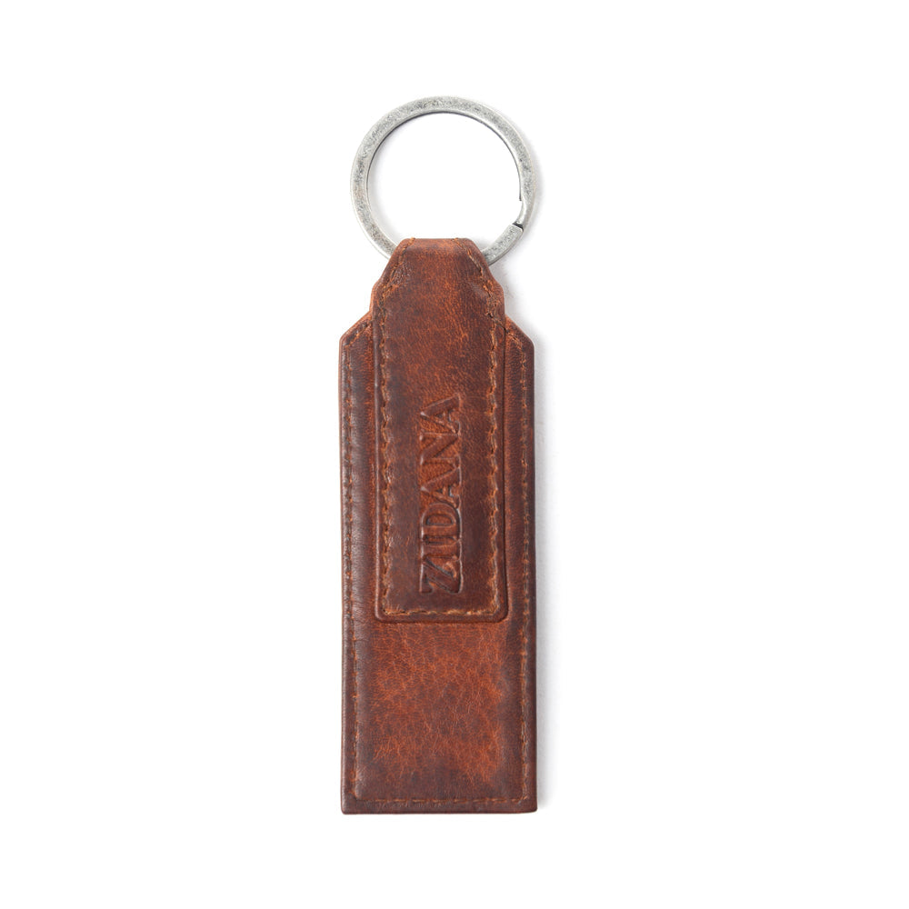 Myra Zidana Highland Studded Veg Tanned Leather Keyfob in Crimson Dust - Myra USA