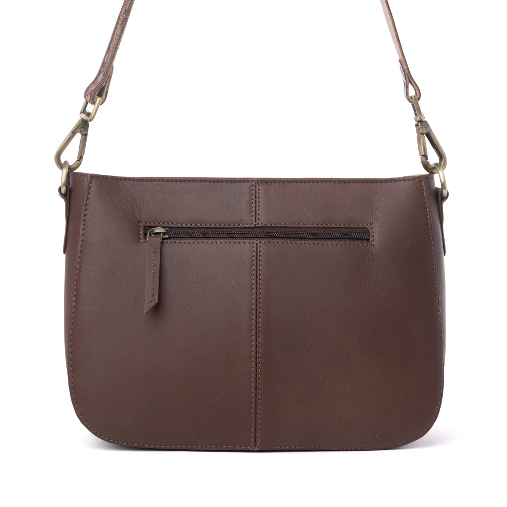 Myra Copper Crest Handtooled Hairon Leather Clutch in Saddle Walnut - Myra USA