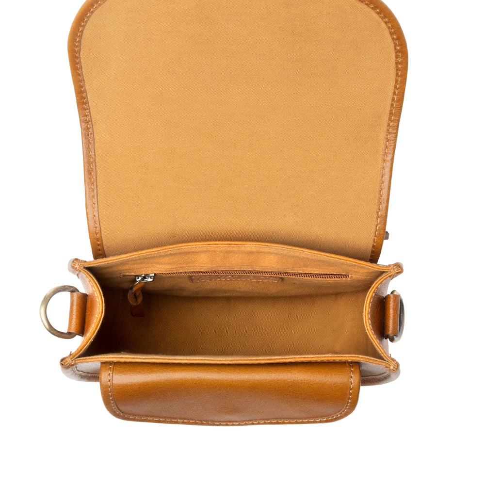 Goldrush Saddle handtooled Bag for Women in saddle tan with hair-on detail - Myra USA