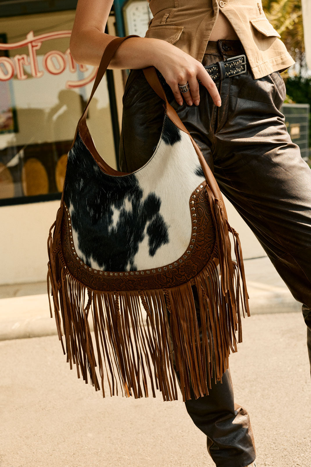 Myra Lasso Lane Hairon Leather Bag for Women in brown with fringe and embossed detail - Myra USA