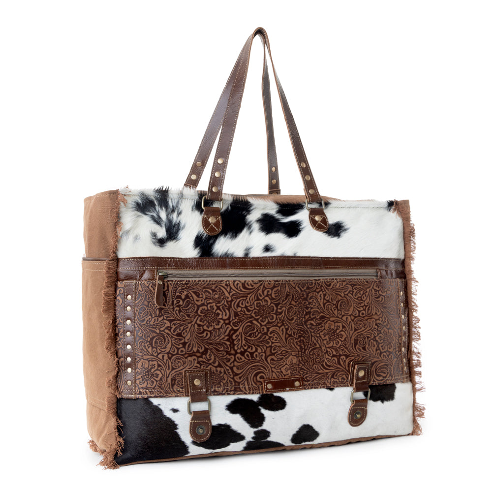 Myra Forester Junction Weekender Bag in tan with hair on and embossed leather