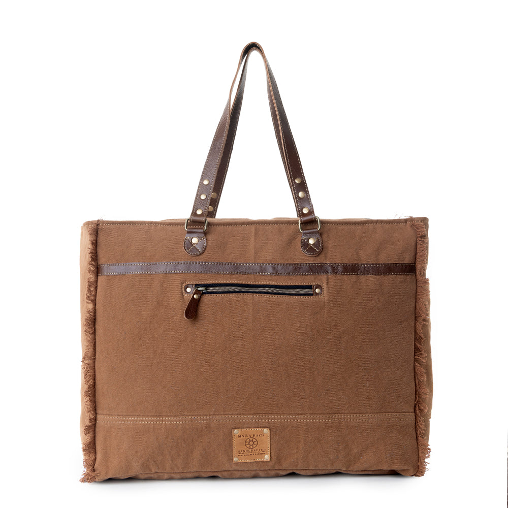 Myra Forester Junction Weekender Bag in tan with hair on and embossed leather