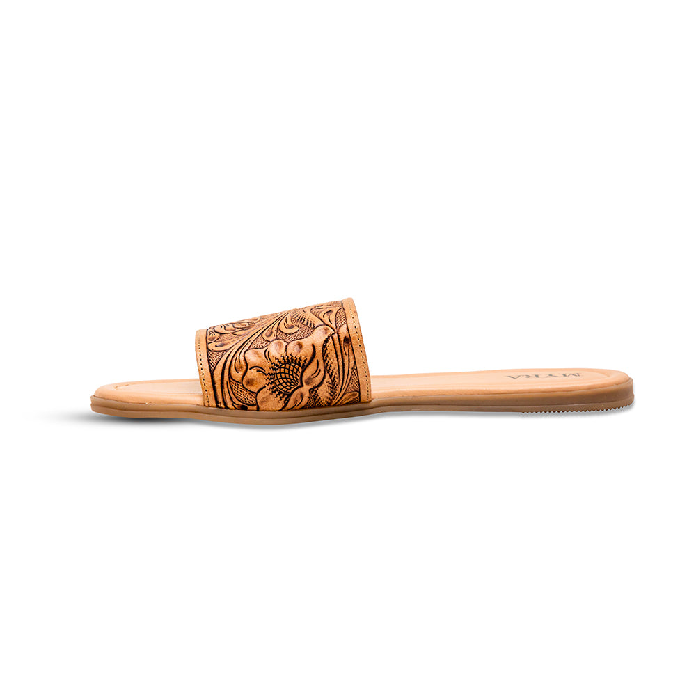 Brown tooled leather sandals with an intricate floral pattern etched into the surface