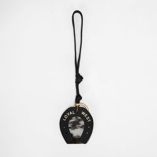 Loyal West HORSE SHOE BAG CHARM IN BLACK & WHITE COWHIDE - Myra USA