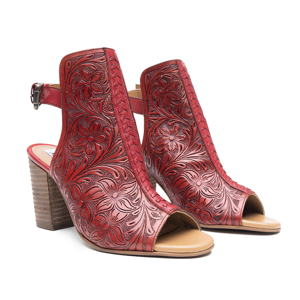 Red handtooled leather heels with a Western flair