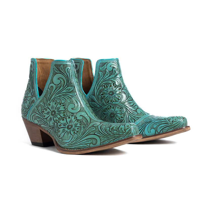 Mayra's hand-tooled western booties in turquoise color with a medium-height heel.