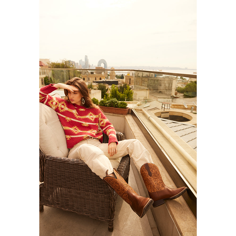 Hand-tooled cowgirl boots in brown colour and embroided design