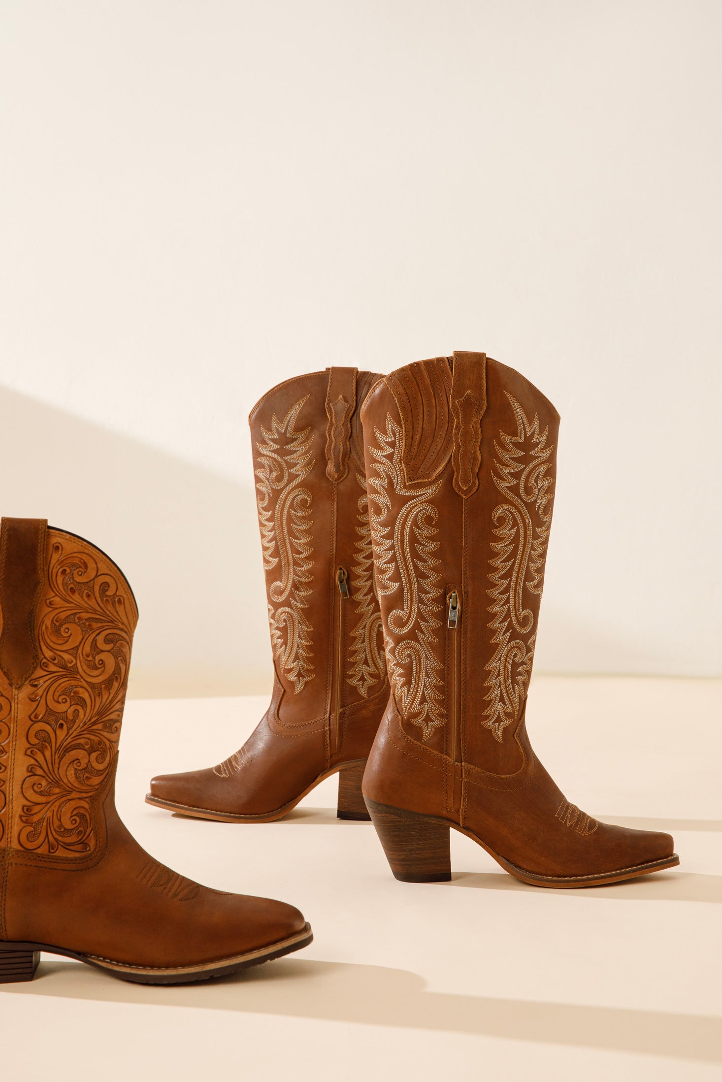 Hand-tooled cowgirl boots in brown colour and embroided design
