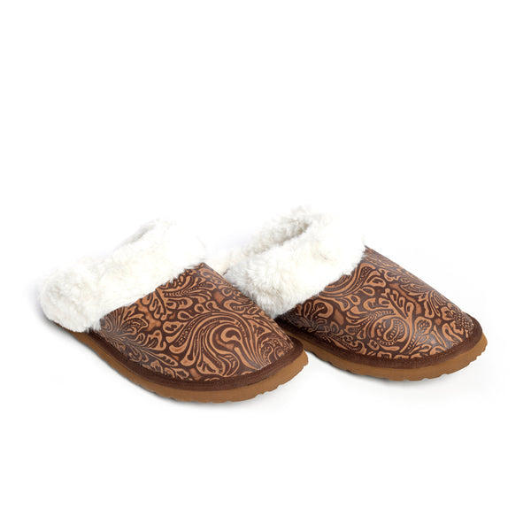 Western slippers with a brown patterned exterior and white fluffy lining