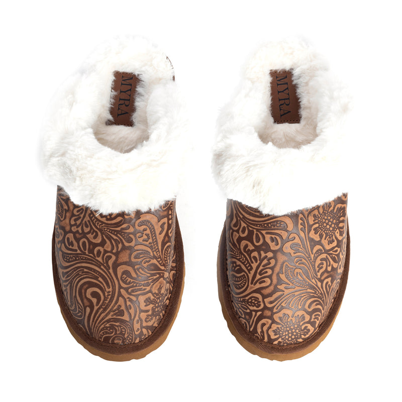 Western slippers with a brown patterned exterior and white fluffy lining