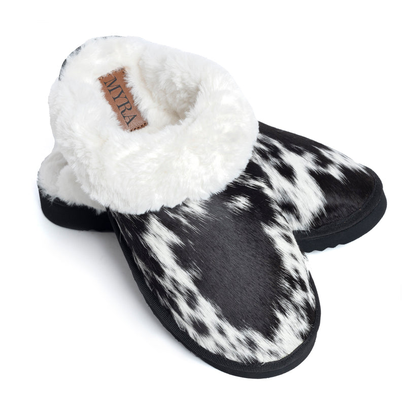 Myra Womens slippers in black and white hairon cowhide material