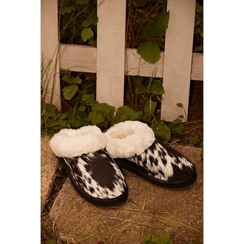 Myra Womens slippers in black and white hairon cowhide material