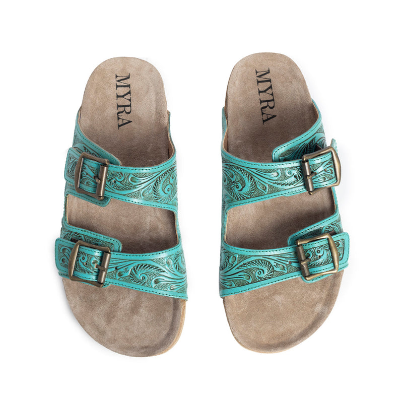 Hand-tooled leather sandals with intricate turquoise color and floral designs