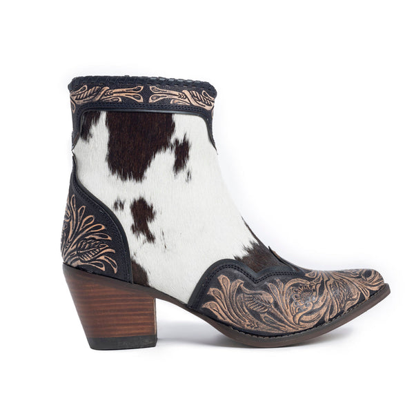 Women's Western Booties in white, black, and brown colors of cowhide patterns 