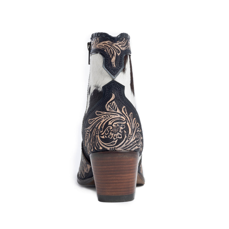 Women's Western Booties in white, black, and brown colors of cowhide patterns 