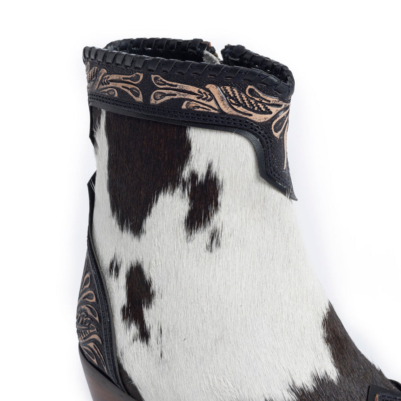 Women's Western Booties in white, black, and brown colors of cowhide patterns 