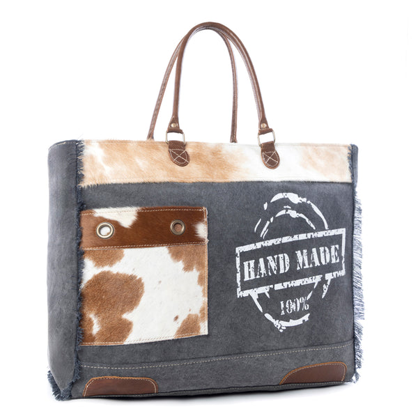 Myra Dakota Trail Hairon Leather Weekender Bag â€“ Handmade Canvas Print with Rustic Fringe Sides & Leather Handles - Myra USA