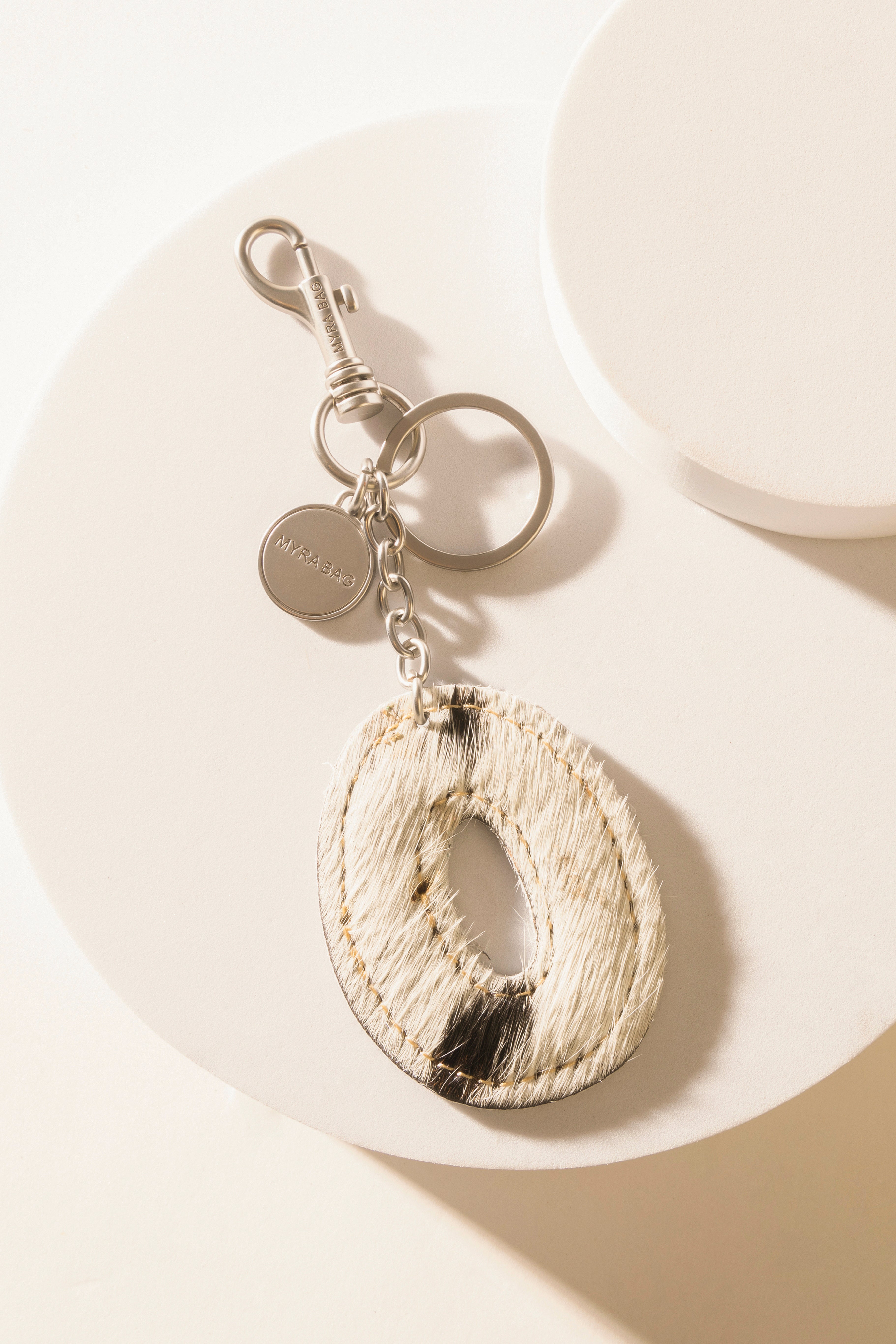 Alpha 'O' Hairon Bag Charm in Vanilla Dust