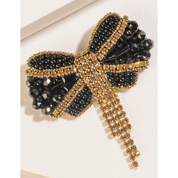 Myra Evening Grace Bow Brooch in Gilded Gold - Myra USA