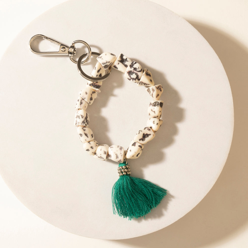 Myra Canyon Storm Tassel Keychain in Speckled Dust - Myra USA