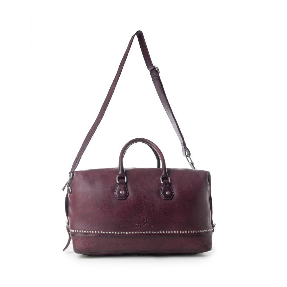 Myra Zidana Sundown Plains Veg Tanned Leather Traveller Bag in Dusty Berry - Myra USA