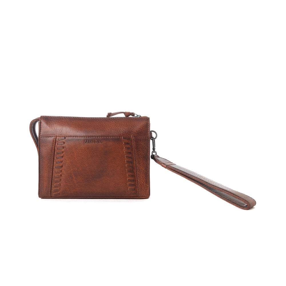 Myra Zidana Bandera Ridge Veg Tanned Leather Wristlet in Vintage Bourbon - Myra USA