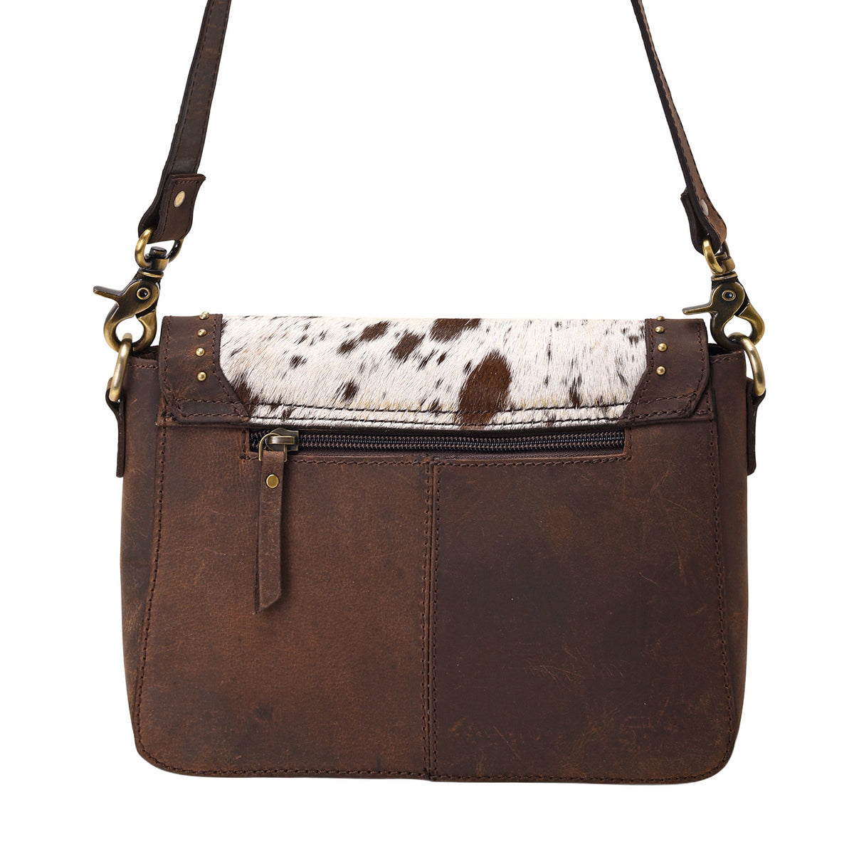 Myra Dustridge Crossbody Bag for Women in brown with hair on, studs and turquoise concho - Myra USA